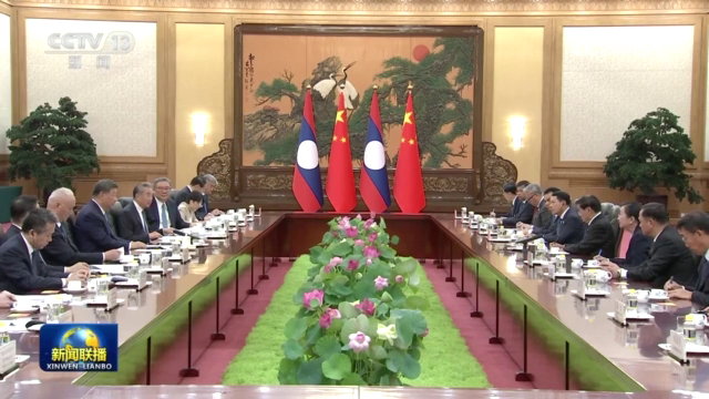 习近平会见老挝人民革命党中央总书记、国家主席